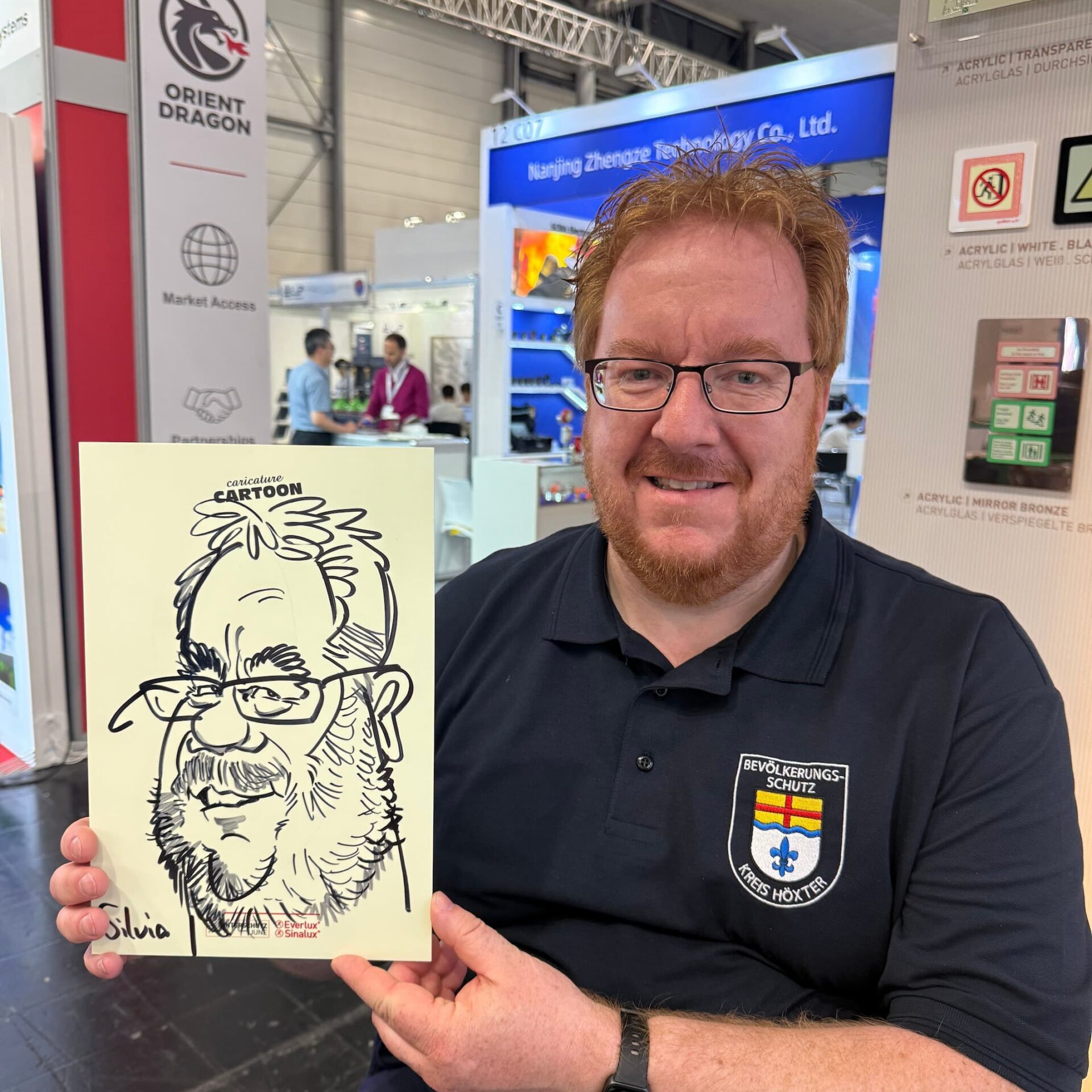 Karikaturen von Schnellzeichnerin Silvia auf der INTERSCHUTZ