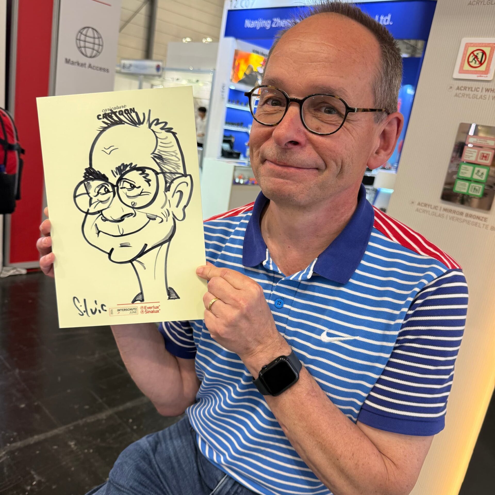 Karikaturen von Schnellzeichnerin Silvia auf der INTERSCHUTZ