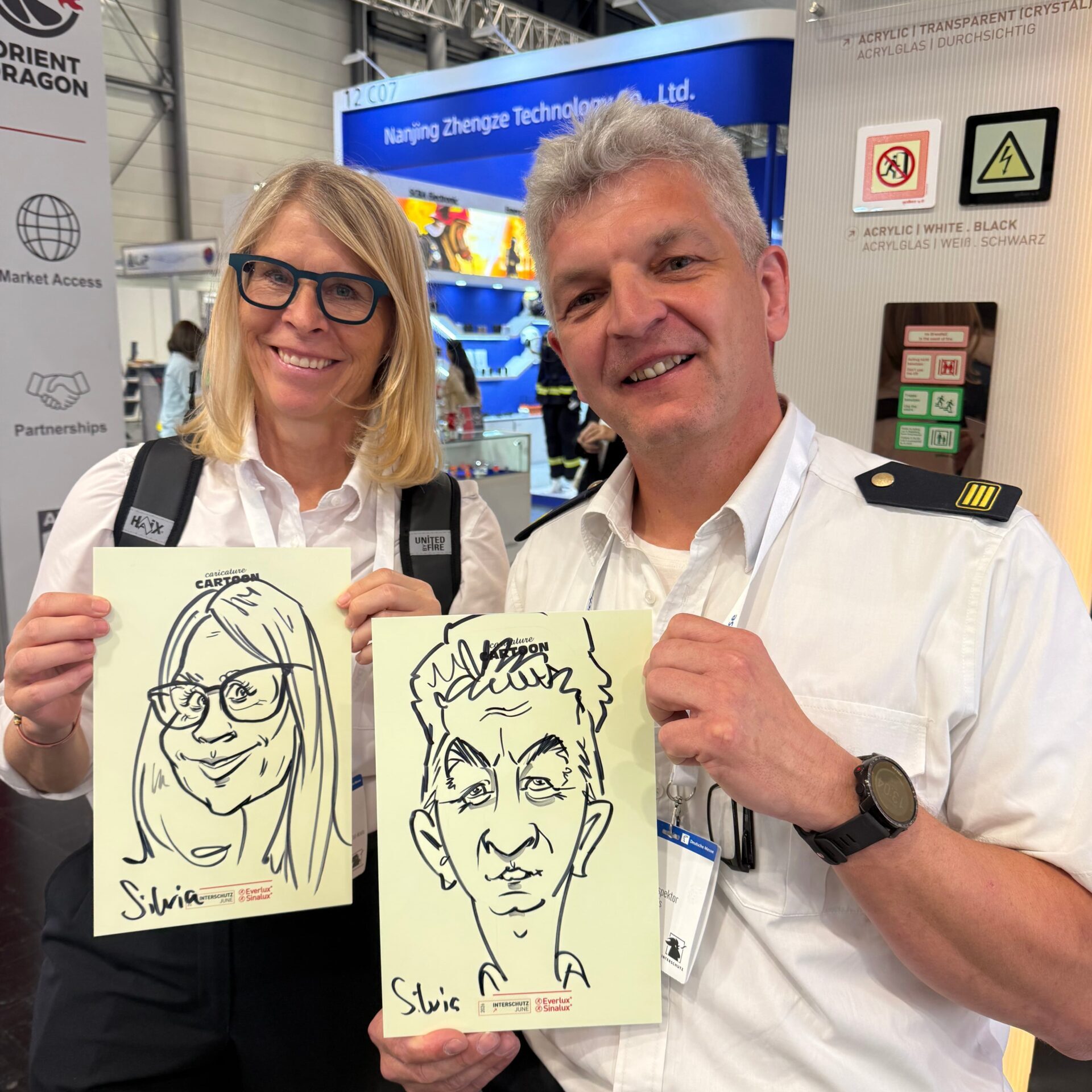 Karikaturen von Schnellzeichnerin Silvia auf der INTERSCHUTZ