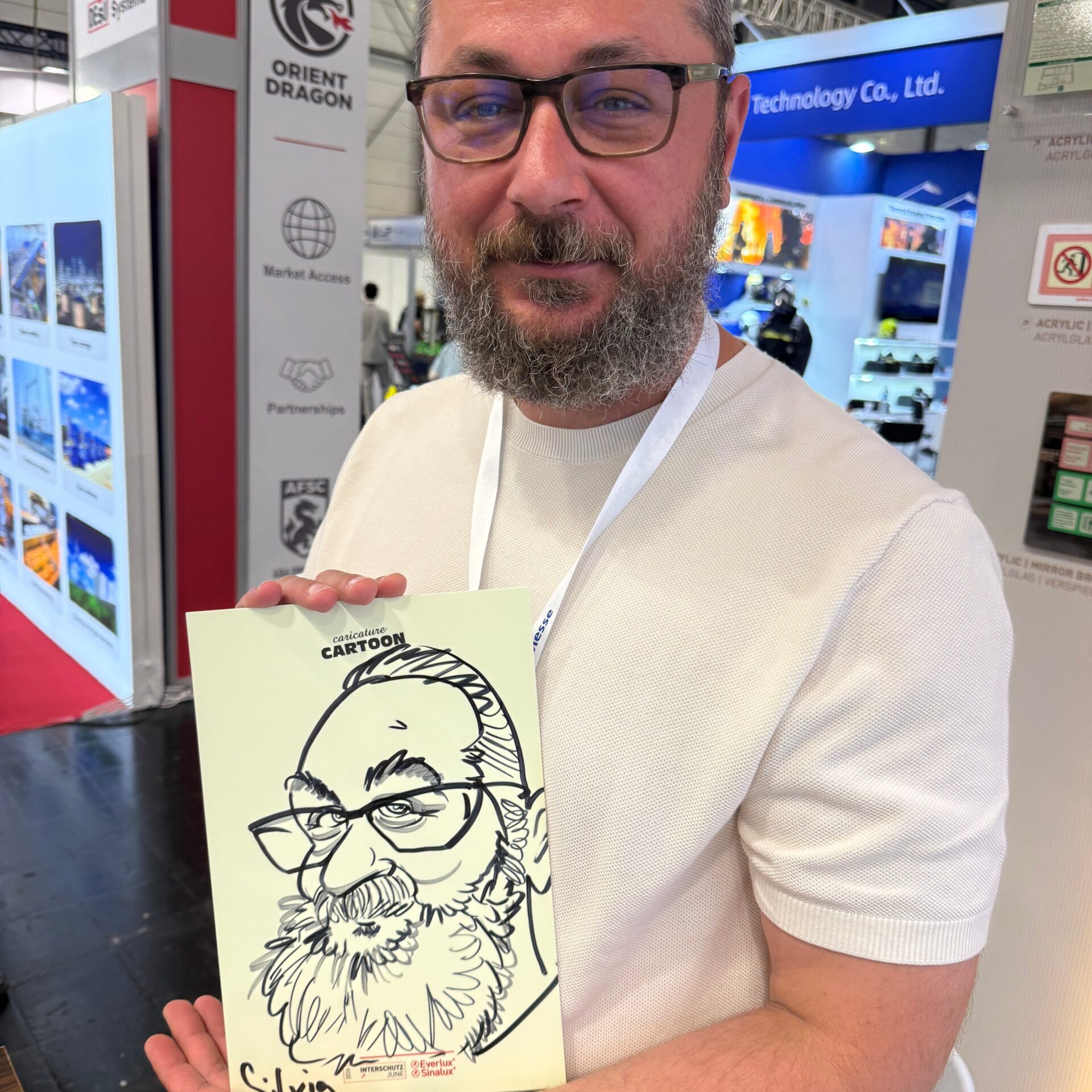 Karikaturen von Schnellzeichnerin Silvia auf der INTERSCHUTZ